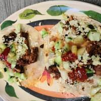 Dorados · Crispy flat tortilla with choice of meat.