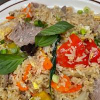 2. Basil Fried Rice · Stir-fried jasmine rice seasoned with brown sauce, egg, Thai basil leaves, carrot, bell pepp...