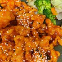 11. Sesame Chicken · Crispy chicken stirred with sweet and sour sauce and sprinkled with sesame seed and side of ...