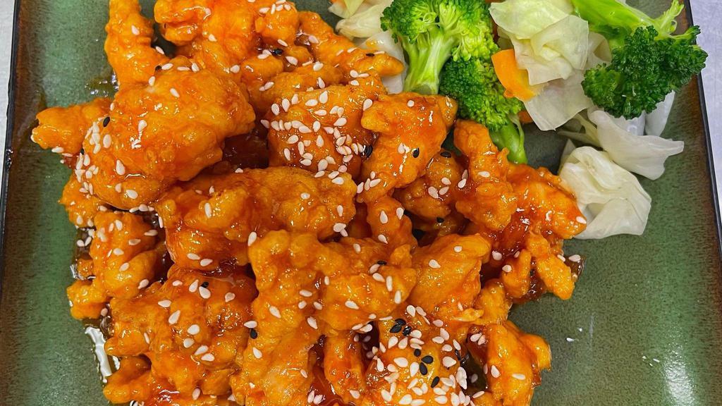 11. Sesame Chicken · Crispy chicken stirred with sweet and sour sauce and sprinkled with sesame seed and side of broccoli.