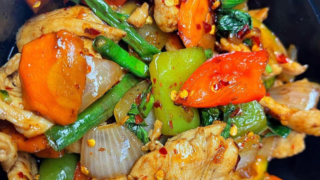 1. Pad Kra Pow · Stir fried with Thai basil, bell pepper, onion, green bean, carrot, zucchini.