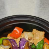 7. Pad Eggplant · Stir-fried eggplant with bell pepper, onion, carrot, zucchini, basil with brown sauce.