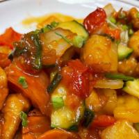 4. Sweet & Sour · Sautéed with cucumber, tomatoes, carrot, onion, pineapple chunks, bell pepper, and green oni...