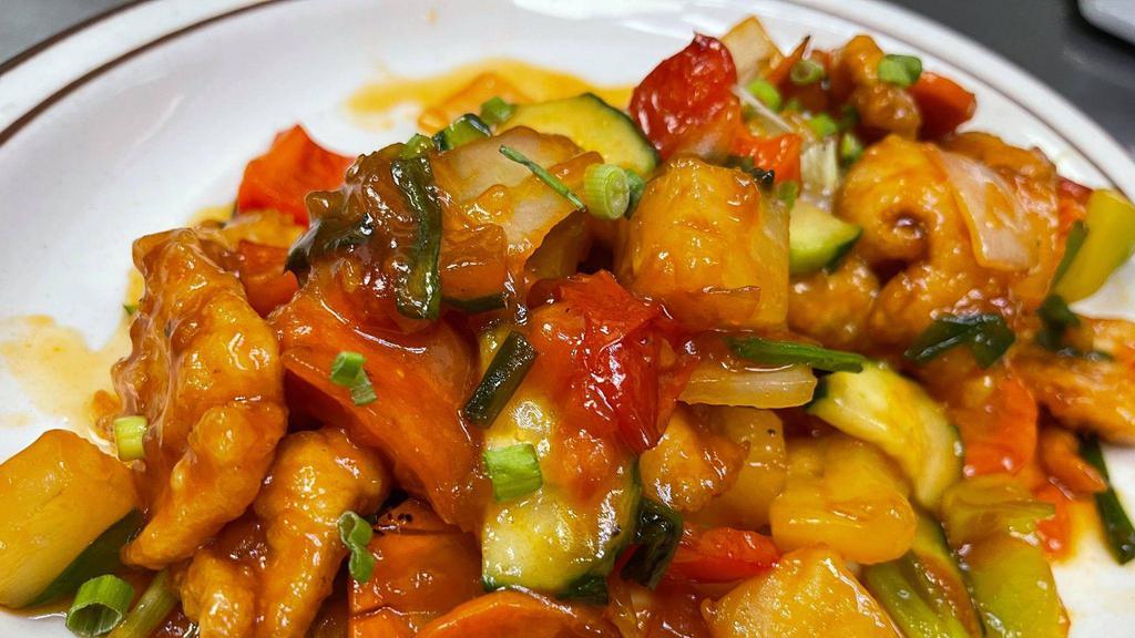 4. Sweet & Sour · Sautéed with cucumber, tomatoes, carrot, onion, pineapple chunks, bell pepper, and green onion in sweet and sour sauce.