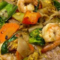 3. Drunken Noodle · Wide rice noodle stir fried with egg, bell pepper, onion carrot, broccoli, basil, zucchini, ...