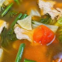 3. Gaeng Som (Sinigang) · Filipino food. Tamarind based soup with bok choy, radish, onions, green beans, and tomatoes.