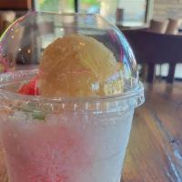 Halo Halo · white beans, red bean, coconut sport string with shaved ice and sweet milk topped with ice c...