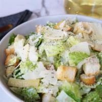 Classic Caesar Salad · Romaine lettuce, shaved parmesan, garlic croutons, caesar dressing