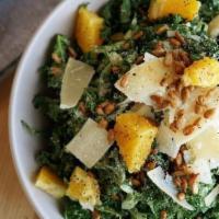 Kale Salad · Toasted sunflower seeds, orange pieces, parmesan cheese, citrus honey vinaigrette