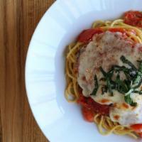 Chicken Parmesan · chicken parmesan, roasted tomato, white wine sauce, house spaghetti, oregano