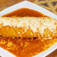 Burrito Mojado / Wet Burrito · Enchilada stye burrito with choice of meat rice beans onion hot sauce covered with enchilada...