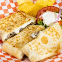 Quesadilla With Meat · Flour quesadilla with choice of meat.