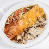 The Company Burrito · Two eggs, cheese, meat. Served with potatoes. Smothered with Red or Green Chile