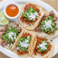 Street Tacos · Carnitas, asada, al pastor, chicken, chorizo.