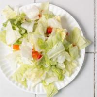Dinner Salad · Lettuce, Roma tomatoes & your choice of dressing.