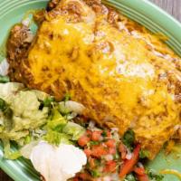 Merida · An extra-large burrito filled with your choice of carnitas, chicken, or beef, beans, rice, l...