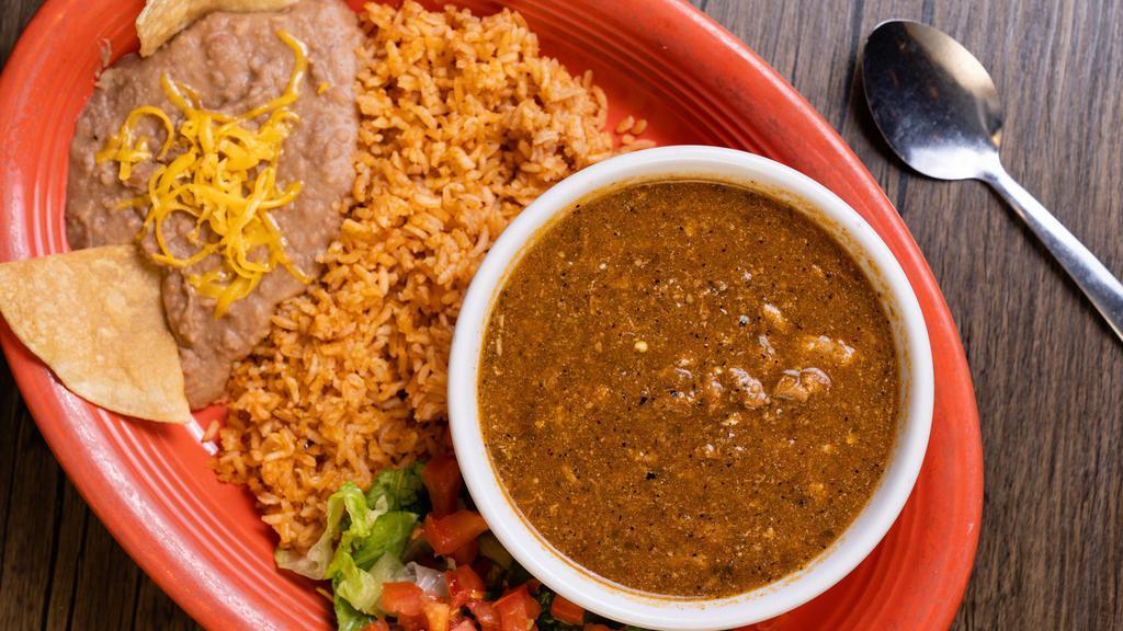 #11 Chile Verde Platter · Cubed pork cooked in green chile and tomatillo sauce and choice of three corn or flour tortillas. Served with rice and beans.