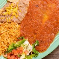 #16 Chile Relleno · Two chiles rellenos topped with roasted salsa roja. Served with rice and beans.