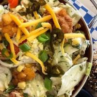 Fried Chicken Tender Salad · crisp greens + tomato + green onion + sweet corn + peppadew peppers + lima beans + cheddar c...