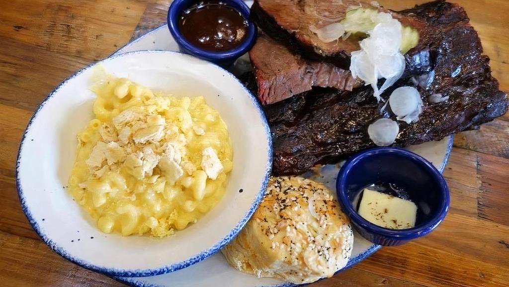 Half Slab Pecan Smoked Spare Ribs And Half Lb. Smoked Brisket Plate* · w/ everything biscuit + one small side