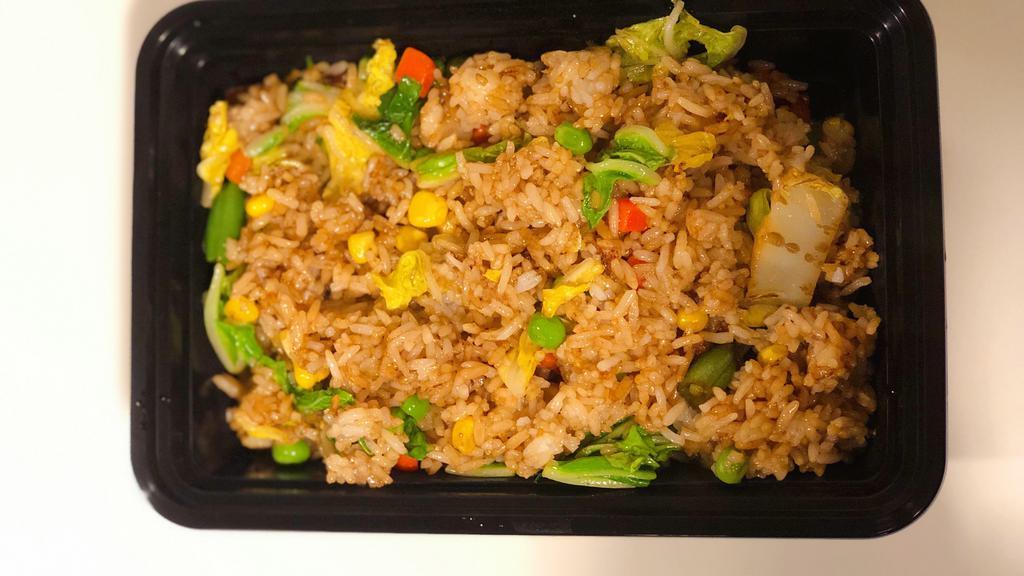 Vegetable Fried Rice 蔬菜炒饭 · [VEGETARIAN]
Chinese cabbage  and rice stir fried with mixed vegetables in brown sauce.