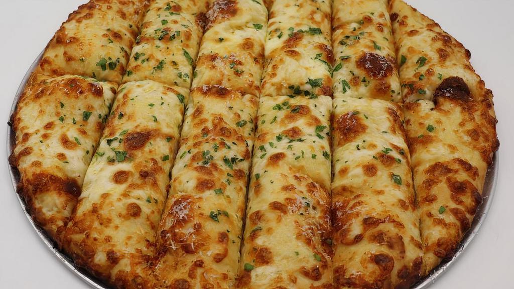 Cheesy B · Our soon to be legendary cheese bread - House Crust + Garlic Parmesan Sauce + Mozzarella + Parmesan + Romano + Parsley