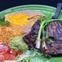Carne Asada · Skirt steak buttered and flame broiled, served with guacamole