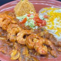 Camarones A La Diabla · Spicy. Large shrimp sauteed in garlic spices and covered with a spicy red hot sauce, served ...