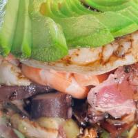 Torre De Mariscos · octopus, cooked shrimp, shrimp cooked in lime, scallops, aji tuna, salmon, shrimp and fish c...