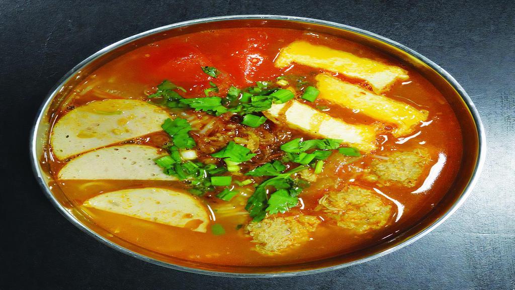Bún Riêu · Rice noodle tomato soup with seafood balls, pork, and tofu.