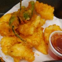 Shrimp & Vegetable Tempura · Lightly battered shrimp and assorted vegetables served with soy dipping sauce.