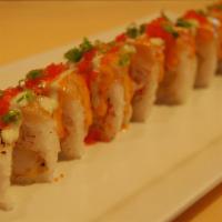 Taylor · Tempura Shrimp, cucumber and crab in Soy paper, topped with spicy tuna, wasabi and spicy may...