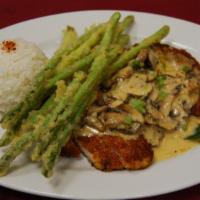 Katsu Chicken · Our tapa house specialty. Pan-seared hand-breaded chicken, with tempura asparagus and deep f...