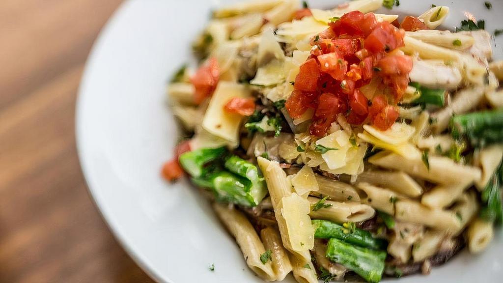 Truffle Chicken Penne · Grilled chicken, garlic, bacon, parmesan, broccolini, truffle cream sauce, penne pasta, tomatoes.