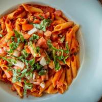 Vgn Penne Pomodoro · Penne pasta, garlic marinara, bruschetta tomatoes, chili flakes.