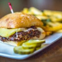 Gf Kalua Pork Sandwich · slow-cooked pulled pork, Fontina cheese, pineapple, Creole remoulade, brioche.