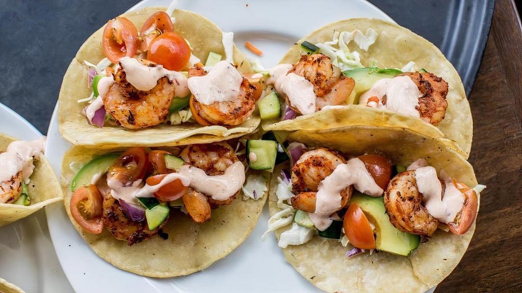 Gf Blackened Shrimp Tacos · Blackened shrimp, fresh avocado, cucumber tomato relish, Twigs slaw, chipotle-lime crema, corn tortillas.