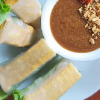 Tofu Salad Rolls · Rice paper rolls with tofu, vermicelli, bean sprouts, lettuce and side of peanut sauce.