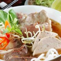 Spicy Noodles Soup · Spicy Soup with beef shank pork shank, vietnamese meatloaf and pork blood