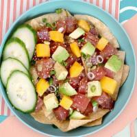 Moloka’I Spicy Yuzu Nachos · Crispy nachos topped with choice of protein, spicy yuzu sauce, avocado, mango, cucumber, gre...