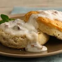 Biscuits & Gravy · Two eggs any style, served with a warm, open-faced biscuit, smothered with rich country grav...