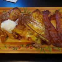 Dad'S French Toast · Two hand-dipped, thick slices of French toast, dusted with powdered sugar and cinnamon, serv...