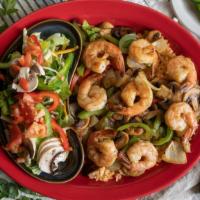 Garlic Shrimp · Sautéed shrimp with minced garlic, bell peppers, mushrooms, and onions. Served on a bed of r...