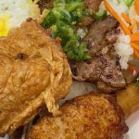 Com Tam Dac Biet · Broken rice with grilled pork chop, shrimp on sugarcane, fried egg, and deep fried bean curd.