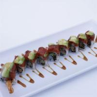 Tiger Roll · Shrimp tempura inside with spicy tuna, avocado on top.
Consuming raw or undercooked meats, p...