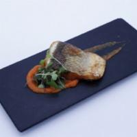 Branzino With Carrot Purée · Grilled branzino served with carrot purée.