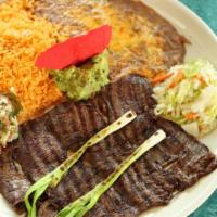 Carne Asada · Steak lovers rejoice, carne asada esta aqui! Si, this famous Mexican preparation of sliced s...