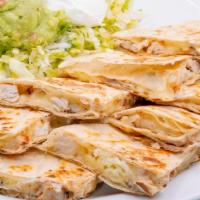 Fajita Quesadilla · Steak or Chicken Fajita, Monterrey jack on flour tortillas with sour cream and fresh guacamo...