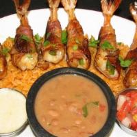Camarones Baja · Six jumbo shrimp stuffed with Monterey jack and jalapeno wrapped in bacon and grilled. Serve...