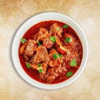 Goan Lamb Vindaloo · A special from the coastal state of Goa, boneless chunks of lamb, slow-cooked in a hot and t...